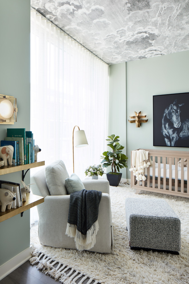 Photo of a classic gender neutral nursery in New York with grey walls, dark hardwood flooring, brown floors and a wallpapered ceiling.