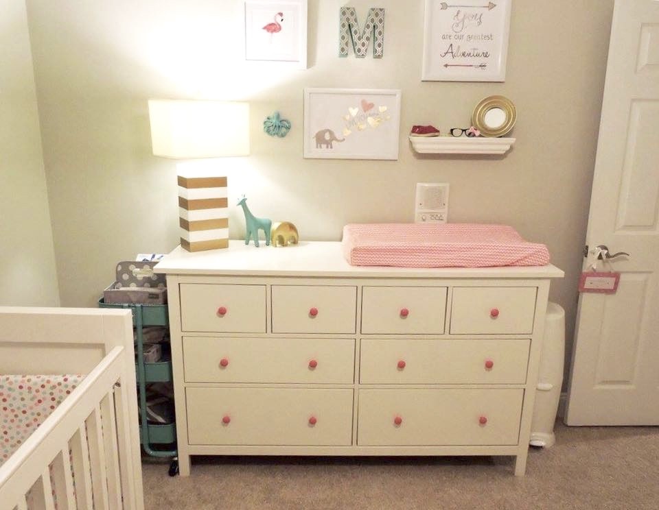 Inspiration for a small traditional nursery for girls in Raleigh with grey walls and carpet.
