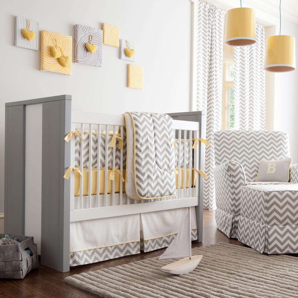 Example of a transitional nursery design in Atlanta with white walls
