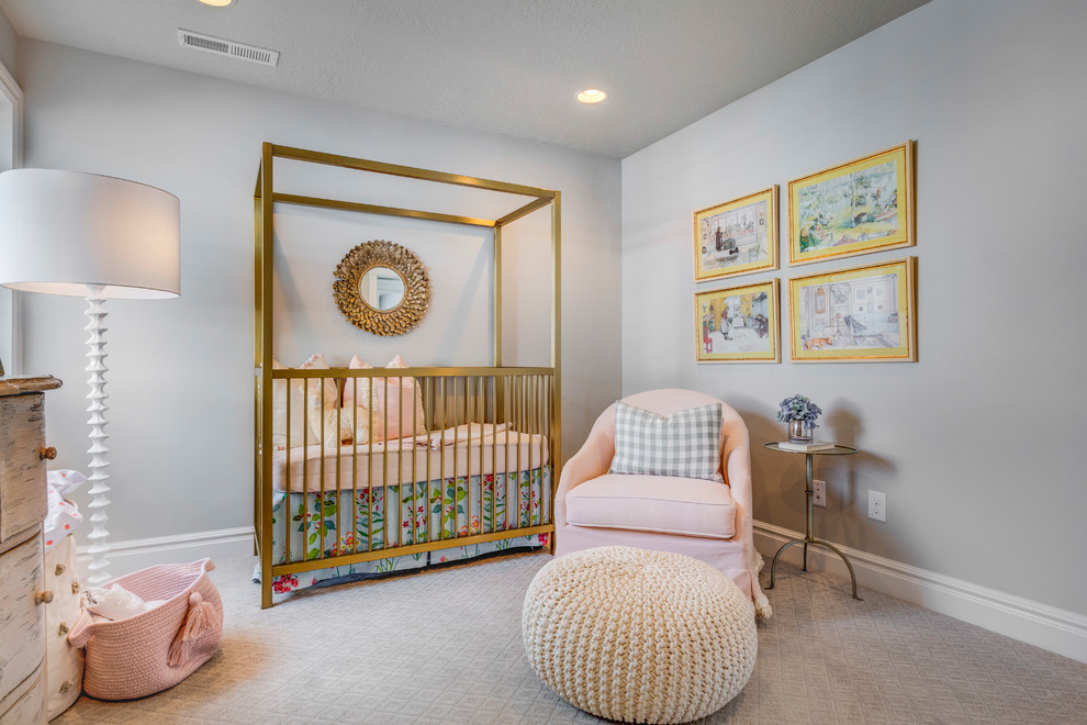 Inspiration for a mid-sized timeless girl carpeted and white floor nursery remodel in Salt Lake City with white walls