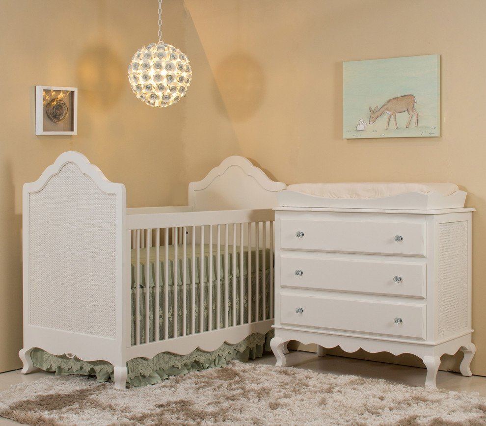 Nursery - mid-sized shabby-chic style girl carpeted nursery idea in Orange County with beige walls