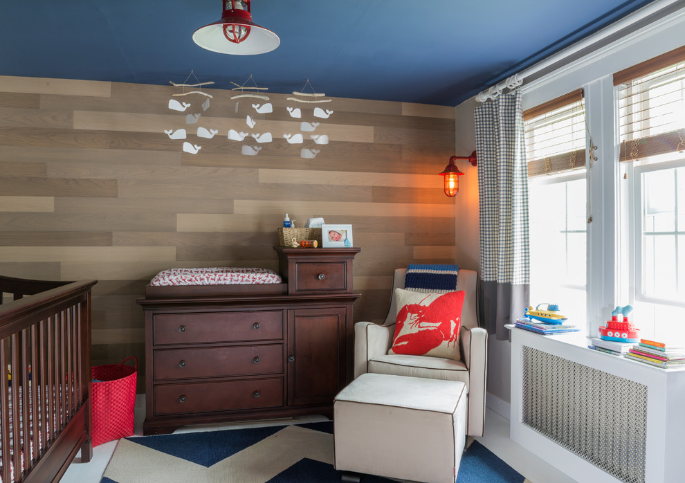 This is an example of a classic nursery for boys in Boston with brown walls and a feature wall.