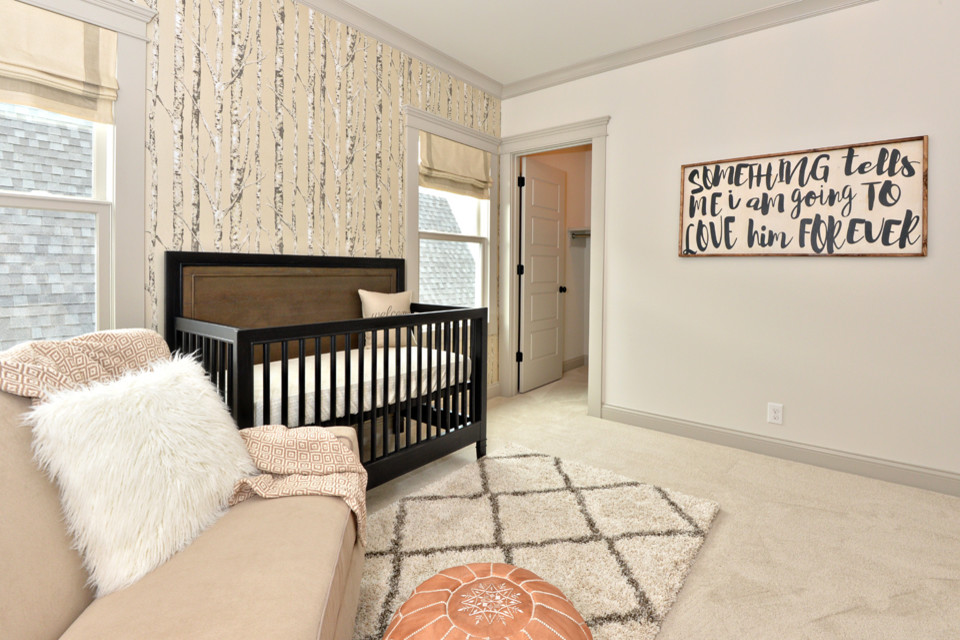 This is an example of an eclectic gender neutral nursery in Louisville with white walls and carpet.
