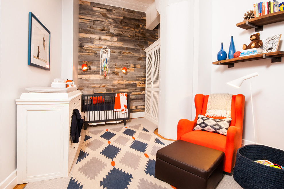 Photo of a rustic nursery for boys in New York with grey walls.