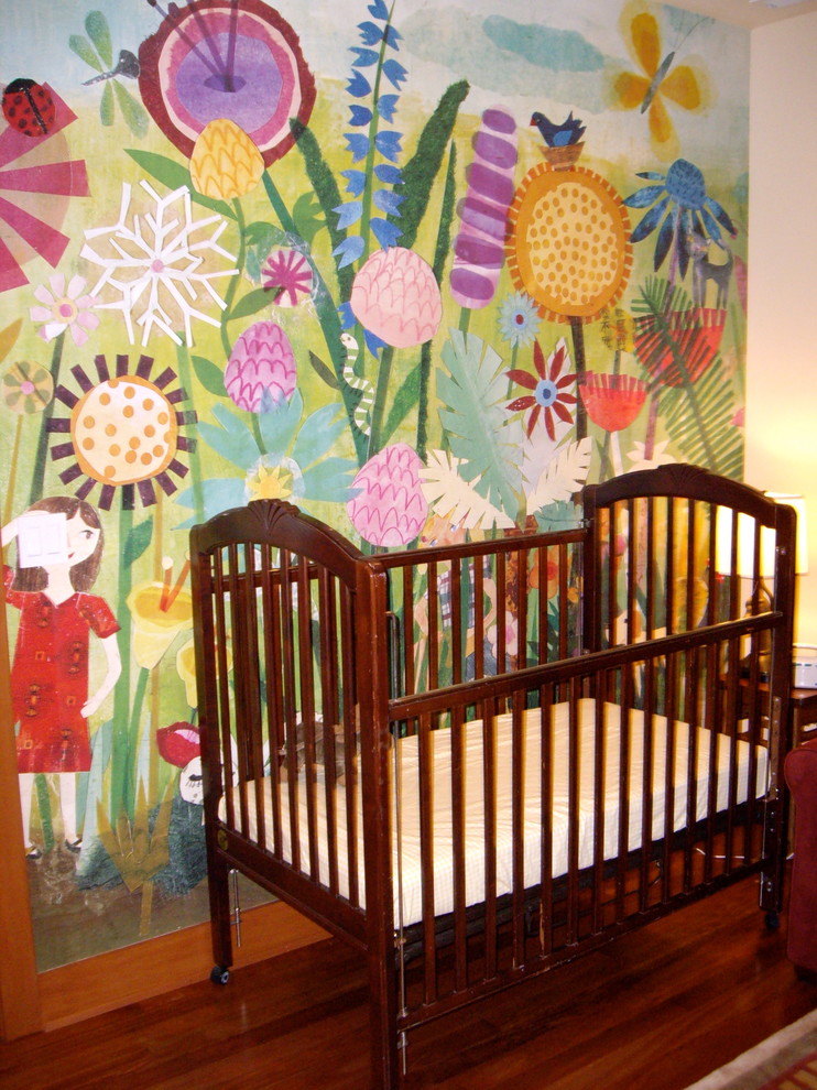 Inspiration for a mid-sized timeless gender-neutral medium tone wood floor nursery remodel in Seattle