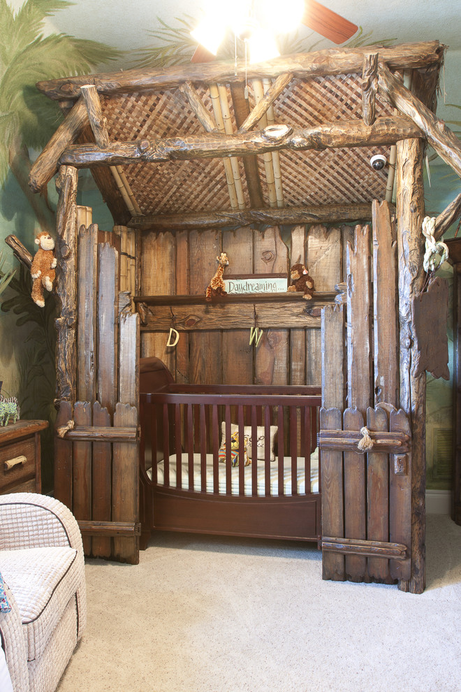 Diseño de habitación de bebé neutra contemporánea grande con paredes multicolor y moqueta