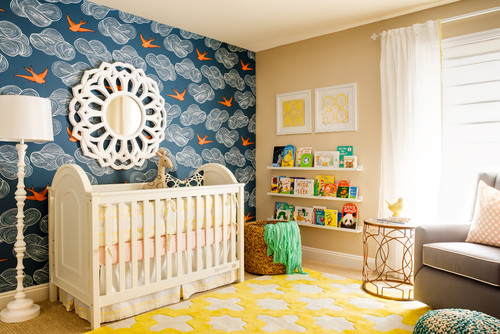 colourful nursery with abstract prints in blues and yellows
