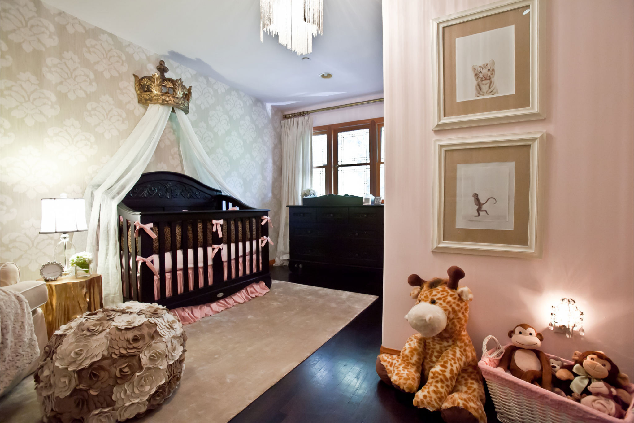 nursery with dark wood furniture