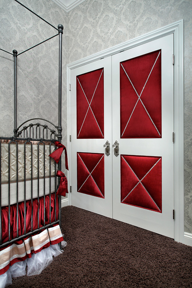 Example of a mid-sized classic girl carpeted nursery design in Phoenix with gray walls