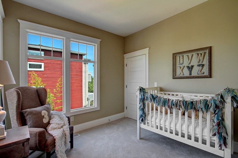 Small ornate gender-neutral carpeted nursery photo in Seattle with green walls