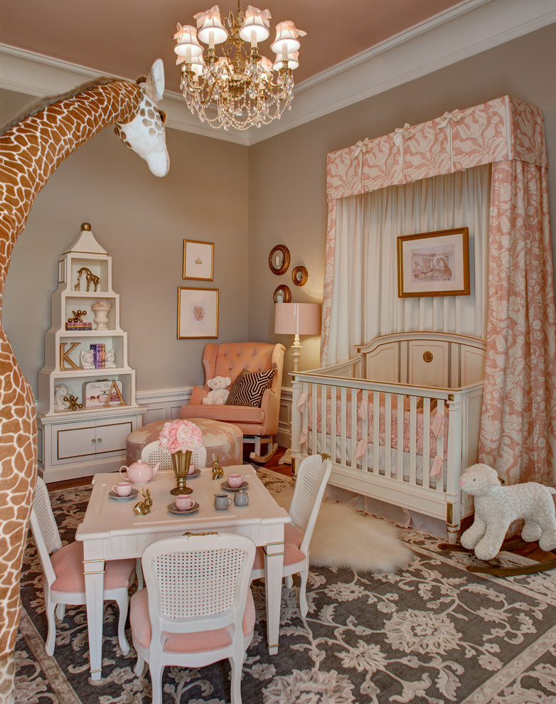 This is an example of a large traditional nursery in New York with feature lighting.