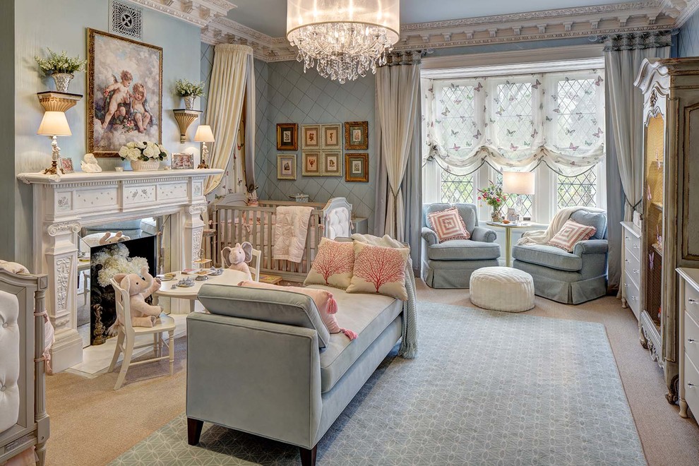Design ideas for a large classic nursery for girls in New York with blue walls, carpet, beige floors and a chimney breast.