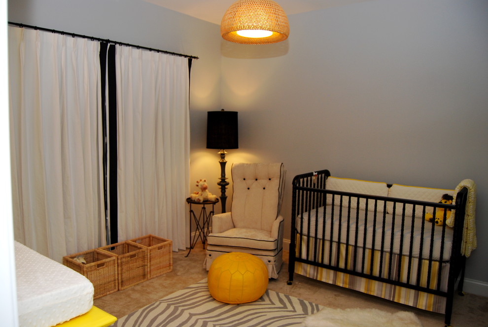 Traditional gender neutral nursery in Raleigh with grey walls.