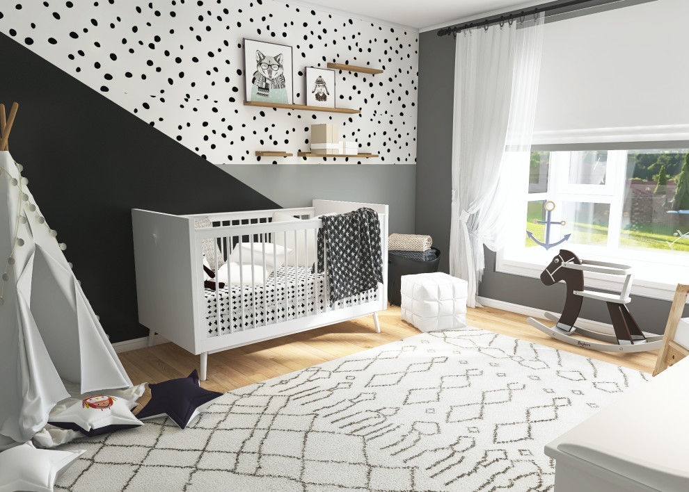 Foto de habitación de bebé neutra moderna de tamaño medio con paredes grises, suelo de madera clara y suelo marrón