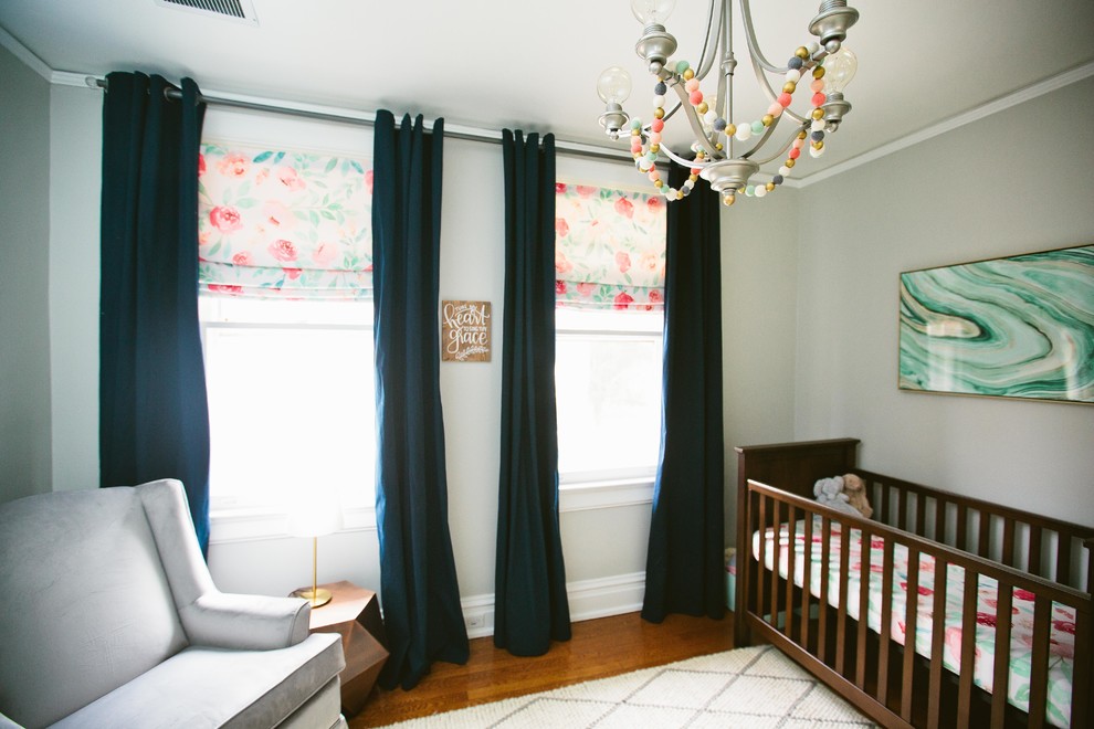 Design ideas for a medium sized traditional nursery for girls in Richmond with grey walls, dark hardwood flooring and brown floors.