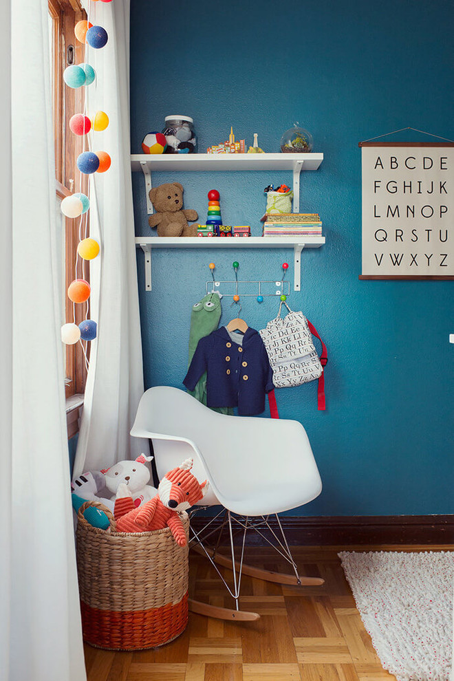Photo of a modern nursery for boys in Salt Lake City with blue walls.