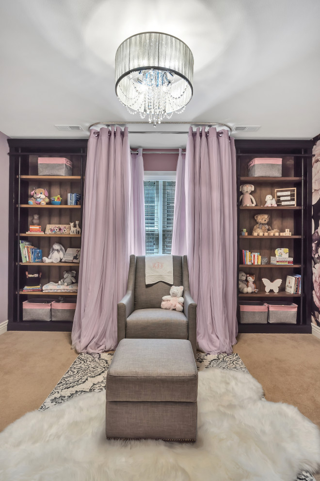 Example of a mid-sized transitional girl carpeted and beige floor nursery design in St Louis with purple walls