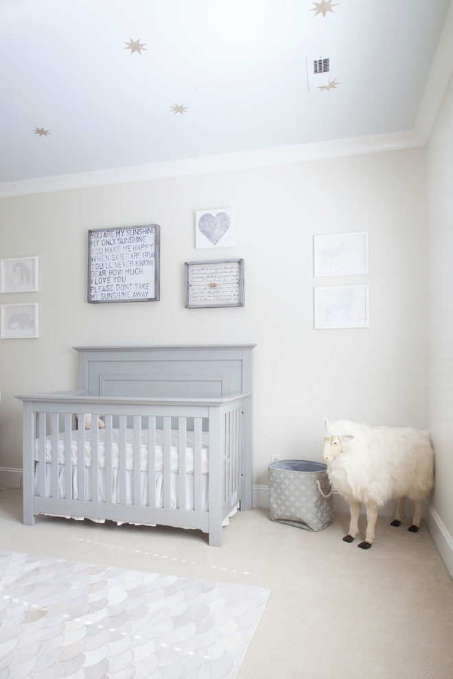 Example of a large eclectic gender-neutral carpeted nursery design in Charlotte with beige walls