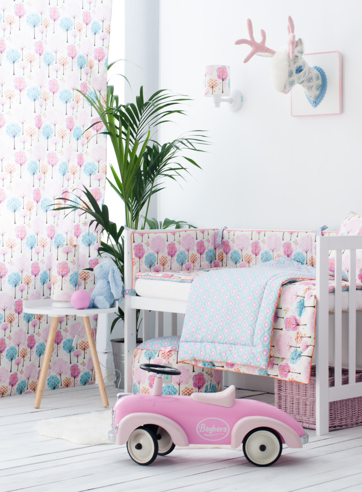 This is an example of a contemporary nursery for girls in London.
