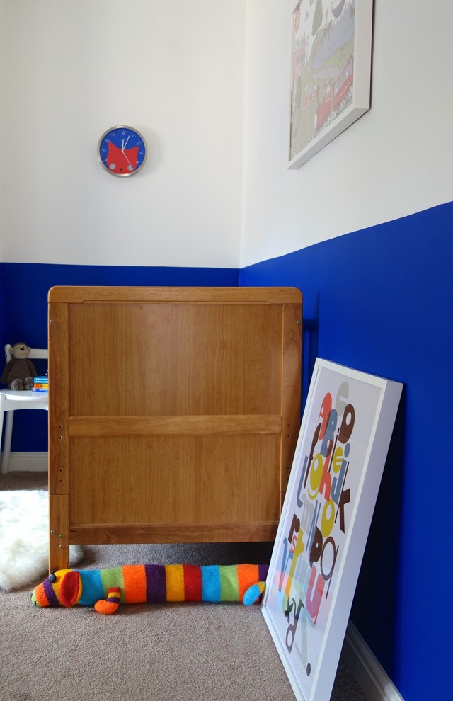 This is an example of a medium sized contemporary nursery in Other.