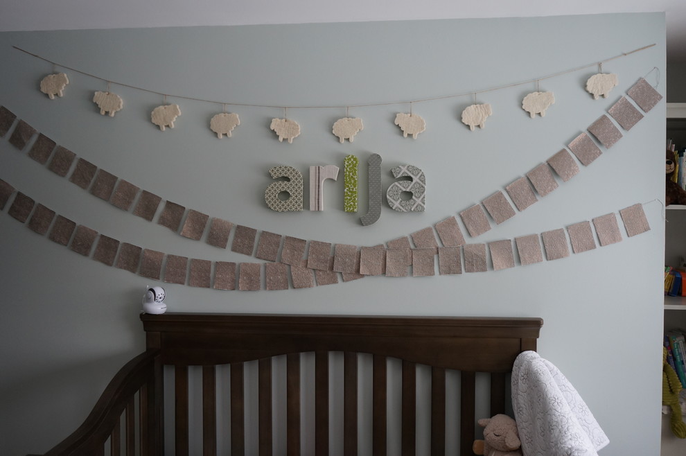 Example of a mid-sized mountain style nursery design in Detroit