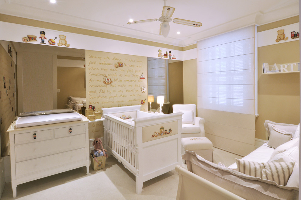 This is an example of a traditional gender neutral nursery in Other with beige walls and carpet.