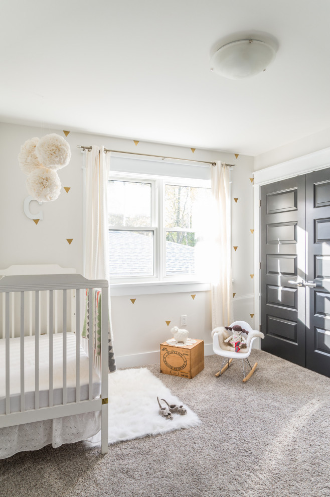 Design ideas for a traditional gender neutral nursery in Toronto with white walls, carpet and grey floors.