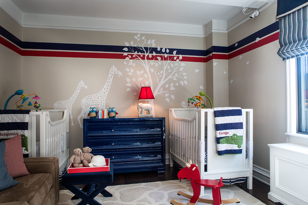 This is an example of a classic nursery for boys in New York with beige walls and dark hardwood flooring.