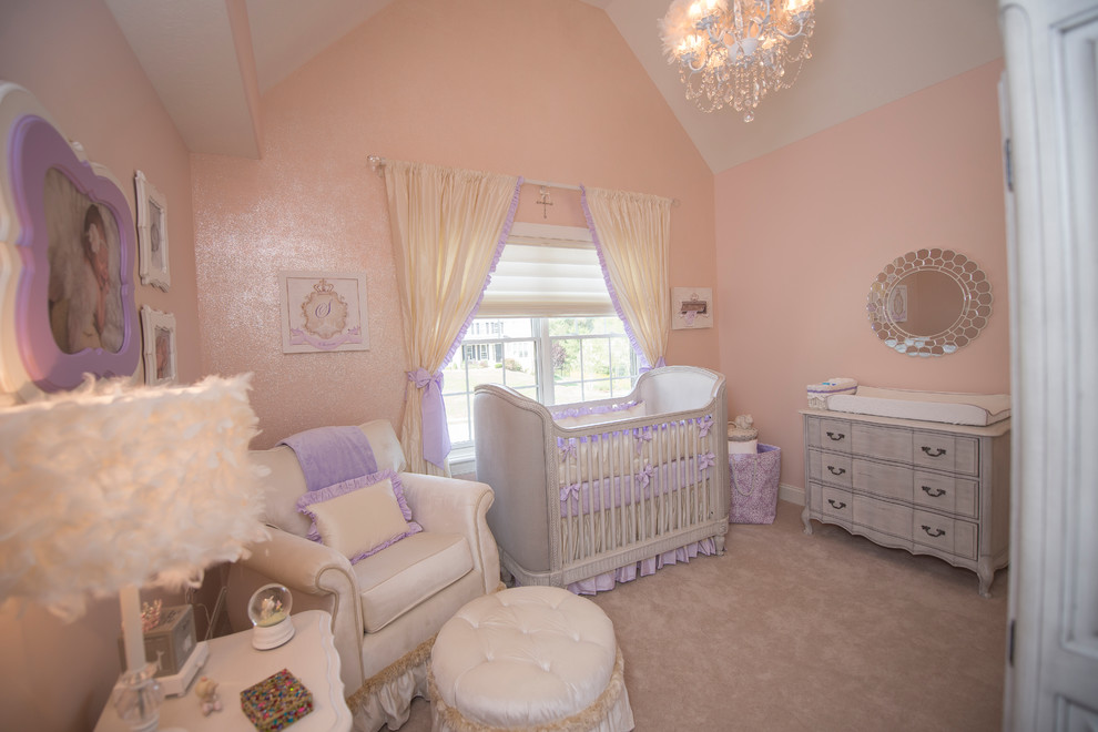 Inspiration for a medium sized classic nursery for girls in Other with pink walls, carpet and white floors.