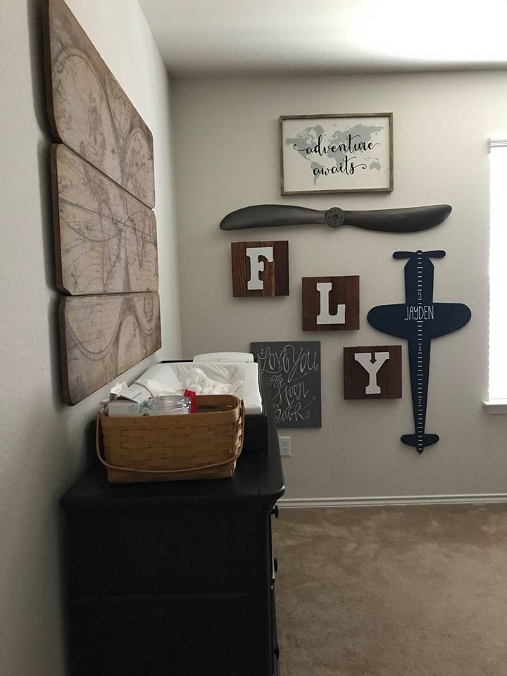 Medium sized classic nursery for boys in Dallas with multi-coloured walls, carpet and beige floors.