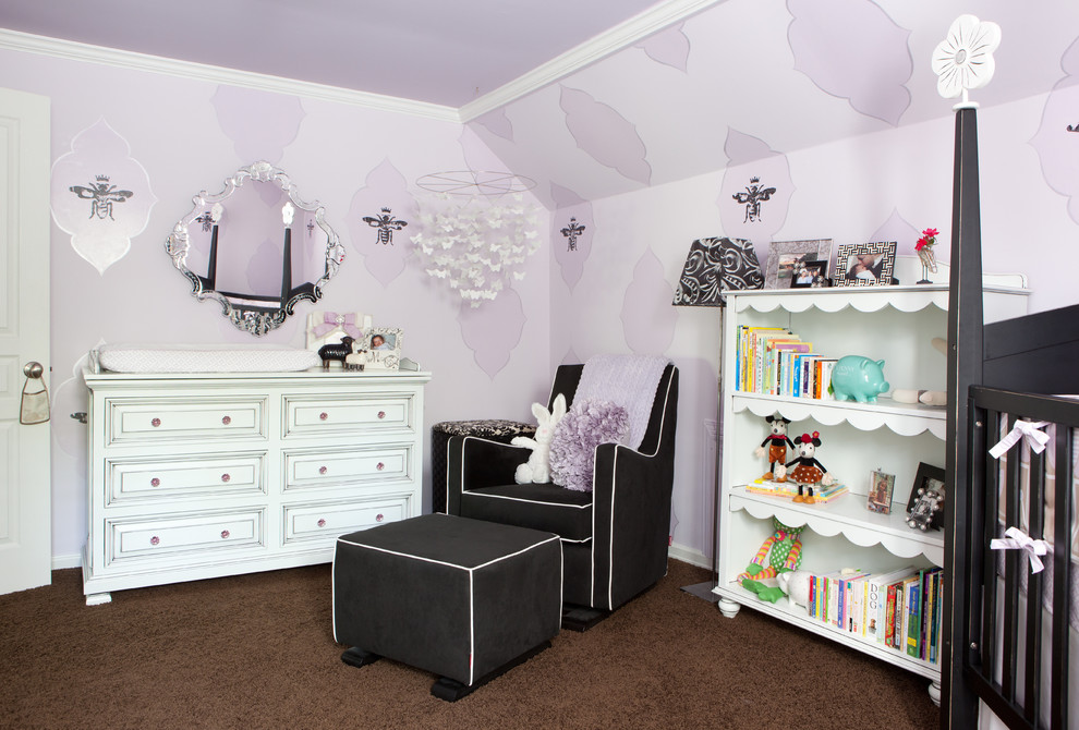 Inspiration for an eclectic girl carpeted and brown floor nursery remodel in Nashville with purple walls