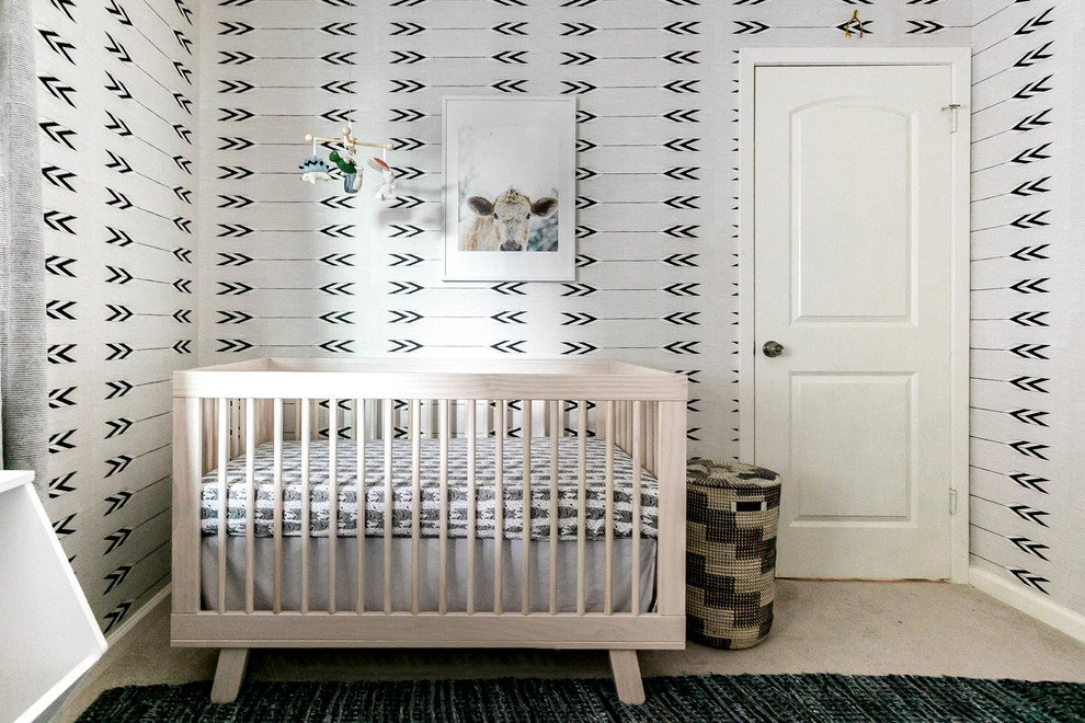 Example of an eclectic nursery design in Austin