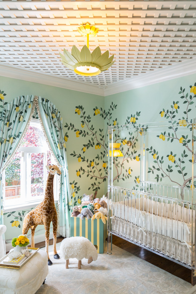 Design ideas for a traditional nursery for girls in San Francisco with multi-coloured walls and dark hardwood flooring.