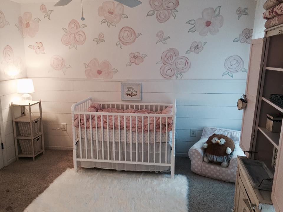Medium sized classic nursery for girls in Atlanta with white walls, carpet and beige floors.
