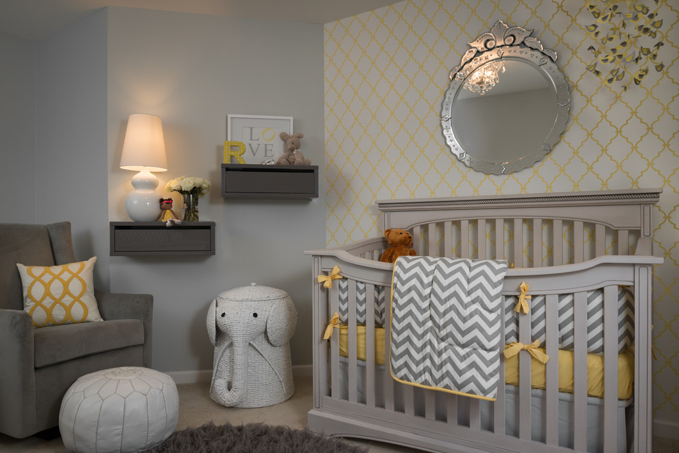 Classic gender neutral nursery in Nashville with grey walls, carpet and a feature wall.