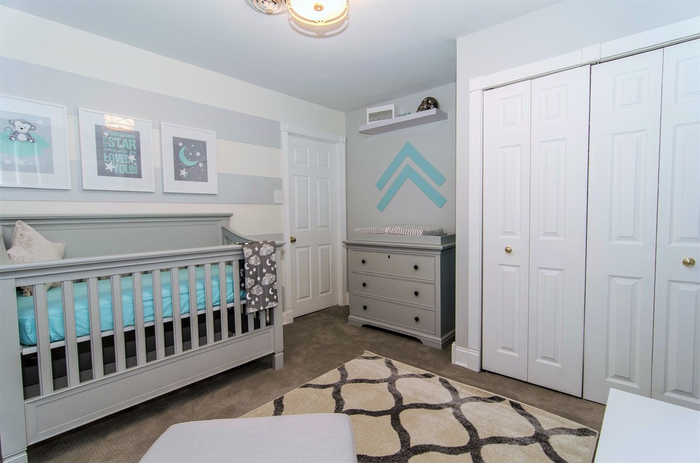 Inspiration for a small transitional boy carpeted nursery remodel in Philadelphia with gray walls