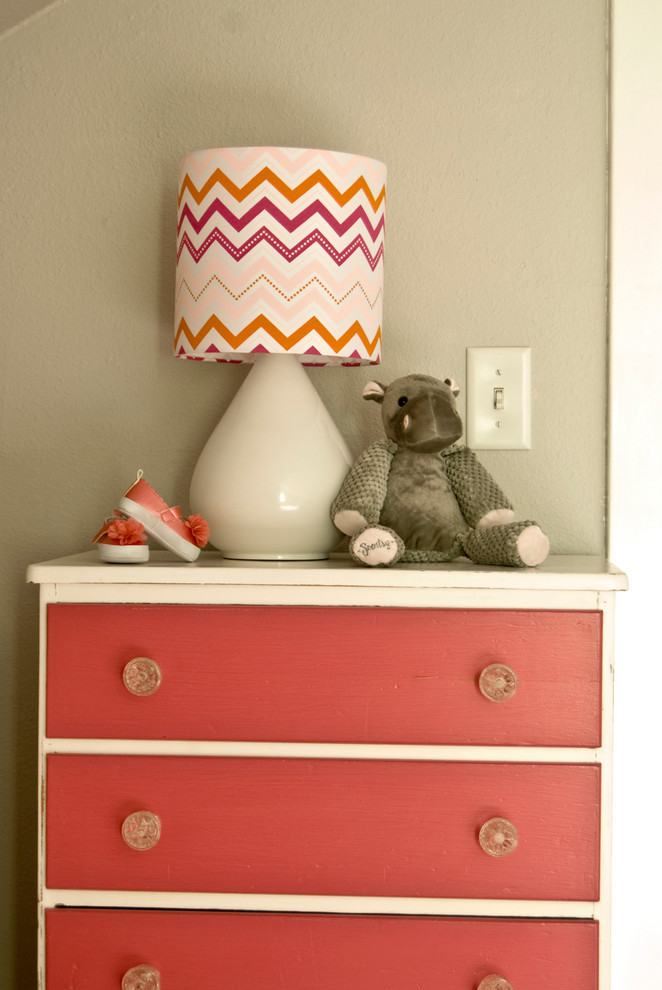 Inspiration for a mid-sized eclectic nursery remodel in Other