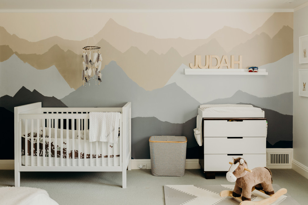 This is an example of a medium sized traditional gender neutral nursery in Portland with beige walls, carpet and beige floors.