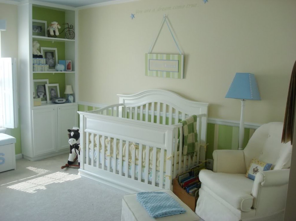 Photo of a traditional gender neutral nursery in Indianapolis with carpet and a dado rail.