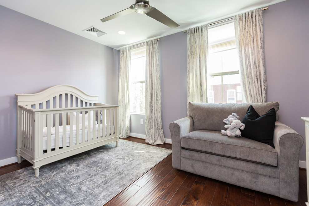 Nursery - mid-sized traditional gender-neutral medium tone wood floor and brown floor nursery idea in Philadelphia with purple walls