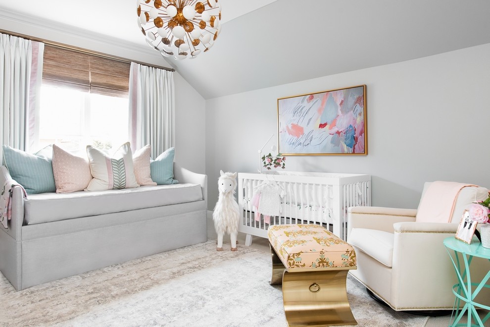 Traditional nursery for girls in Austin with grey walls and feature lighting.