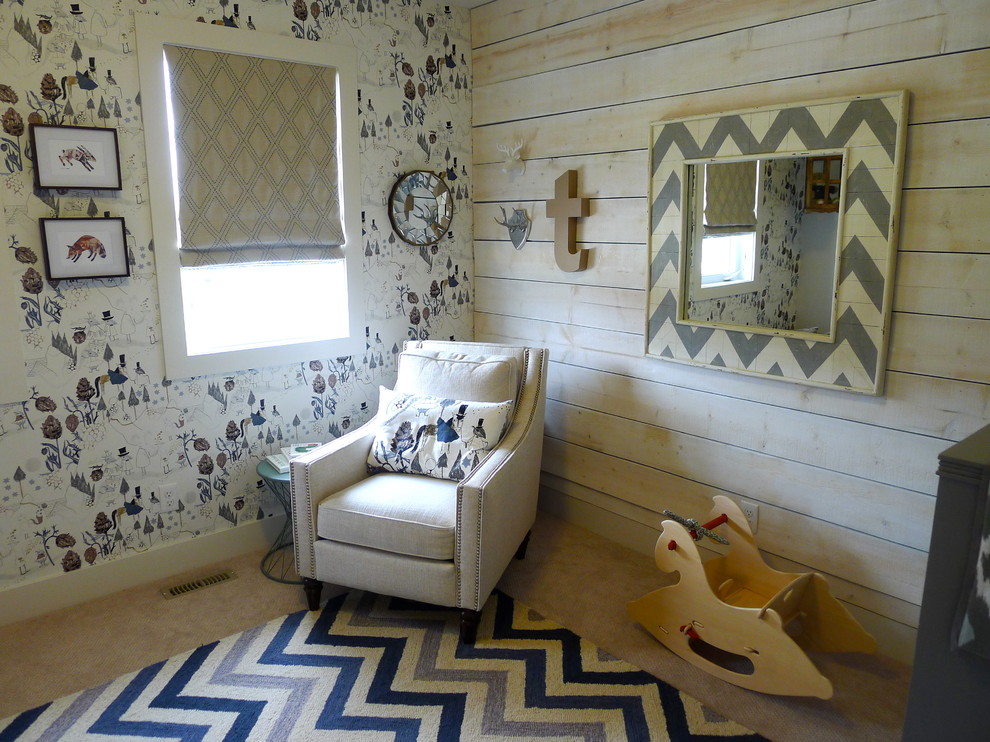 Idée de décoration pour une chambre de bébé neutre bohème de taille moyenne avec un mur blanc et moquette.
