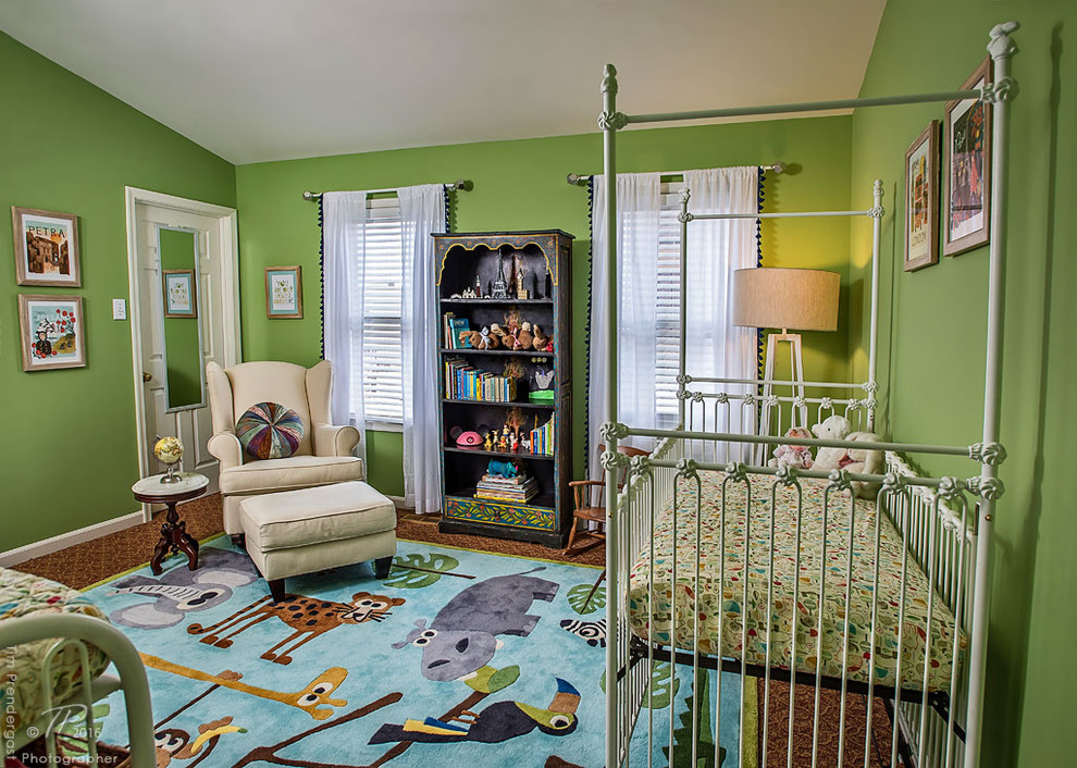 Medium sized modern gender neutral nursery in Baltimore with green walls and carpet.