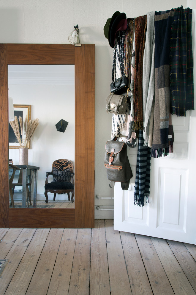 Inspiration for an eclectic closet remodel in Copenhagen