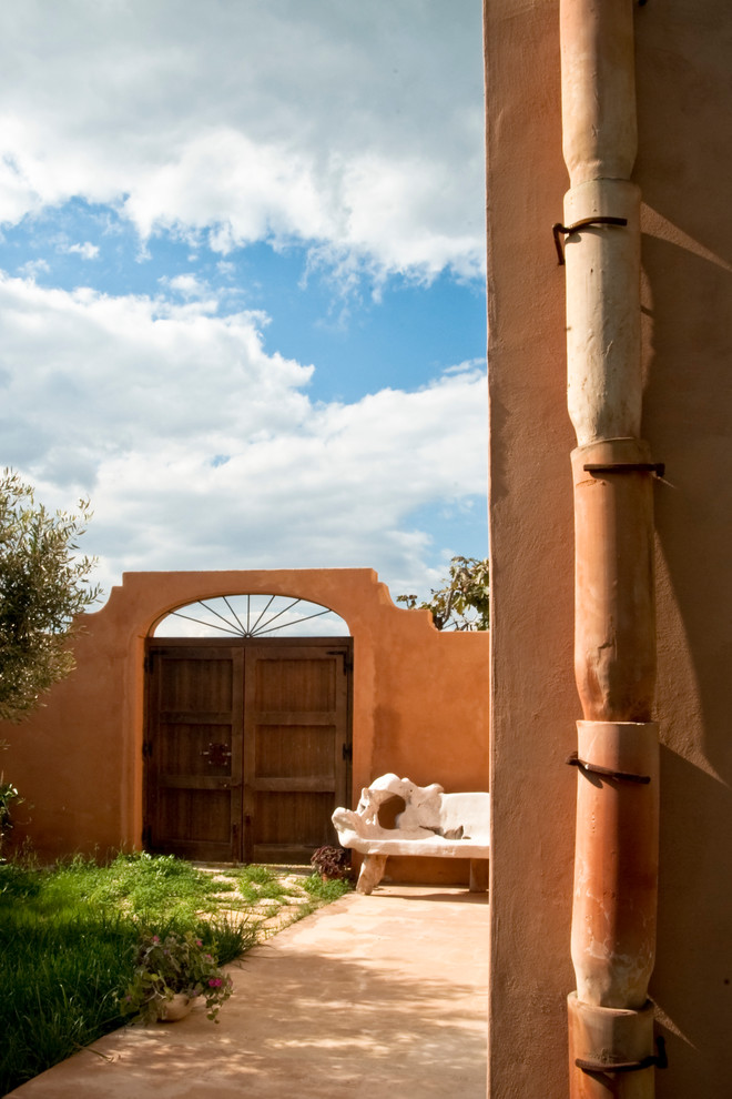 Foto di un patio o portico country