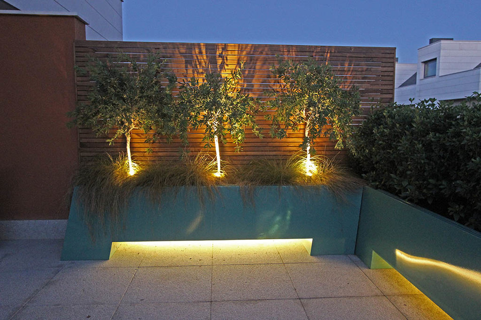 Idée de décoration pour une terrasse design.