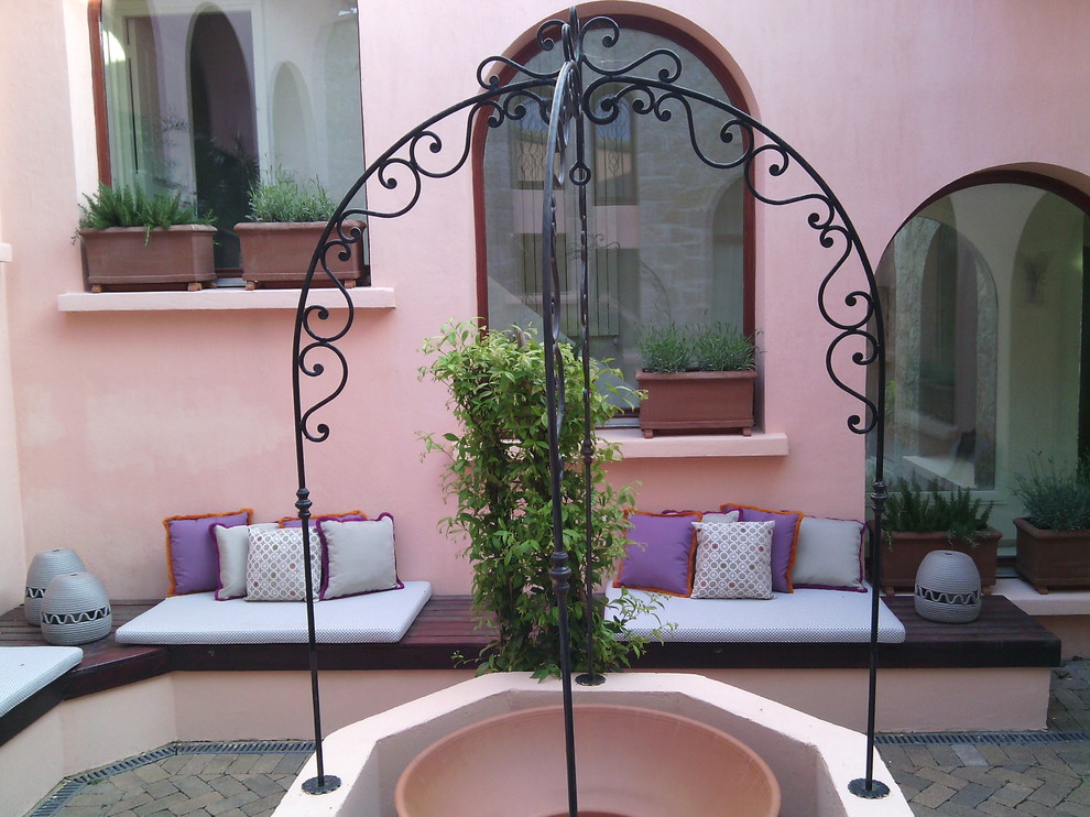This is an example of a mediterranean patio in Milan.