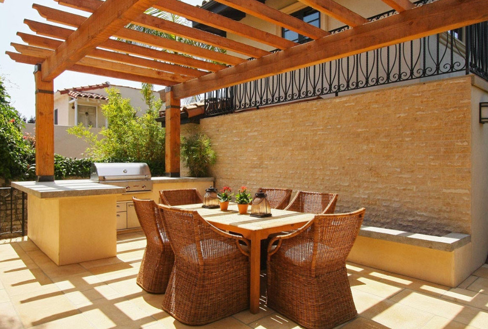 Mediterranean patio in Los Angeles with a pergola and a bbq area.