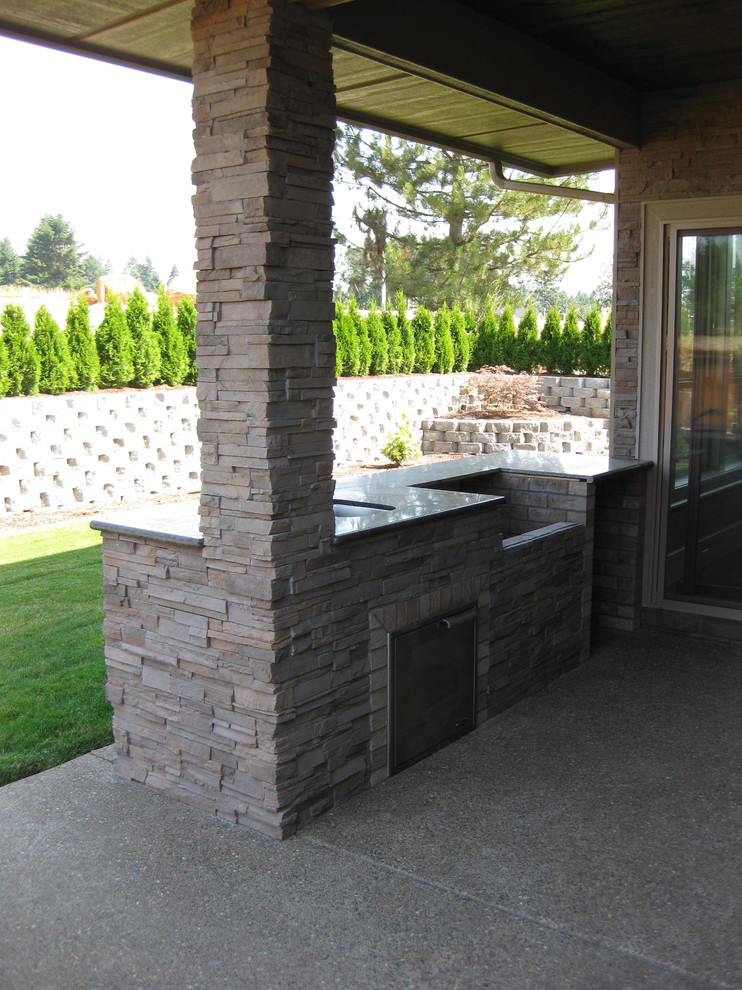 Inspiration for a transitional backyard patio remodel in Portland
