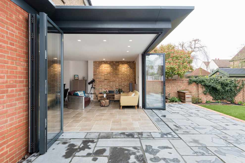 This is an example of a contemporary back patio in Other with no cover.